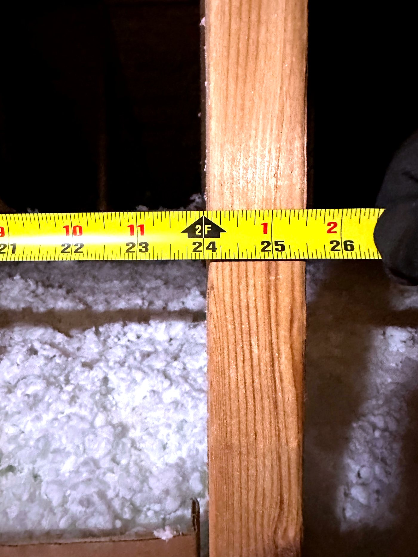 Timestamped attic truss measurement photograph from a residential solar site assessment
